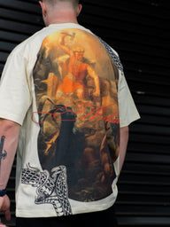 Close-up of the Thunder classical painting back print on the pastel cream Premium tee, worn