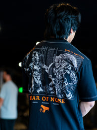 Back of the Fear of None Premium oversized tee in black, worn by model, side angle