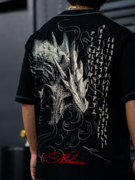 Close-up of the Warmonger white dragon back print on the black Premium oversized tee