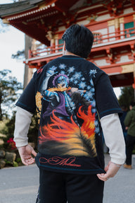 Close-up of the Set Your Heart flame fighter back print on the black Premium tee, worn