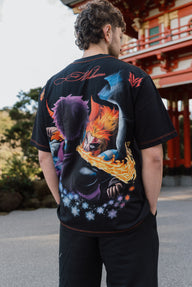 Close-up of the Ablaze fighter and flame back print on the black Premium tee, worn