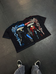 Sons of Sparda bundle: Let's Rock! and Motivated Premium oversized tees in black, laid flat together